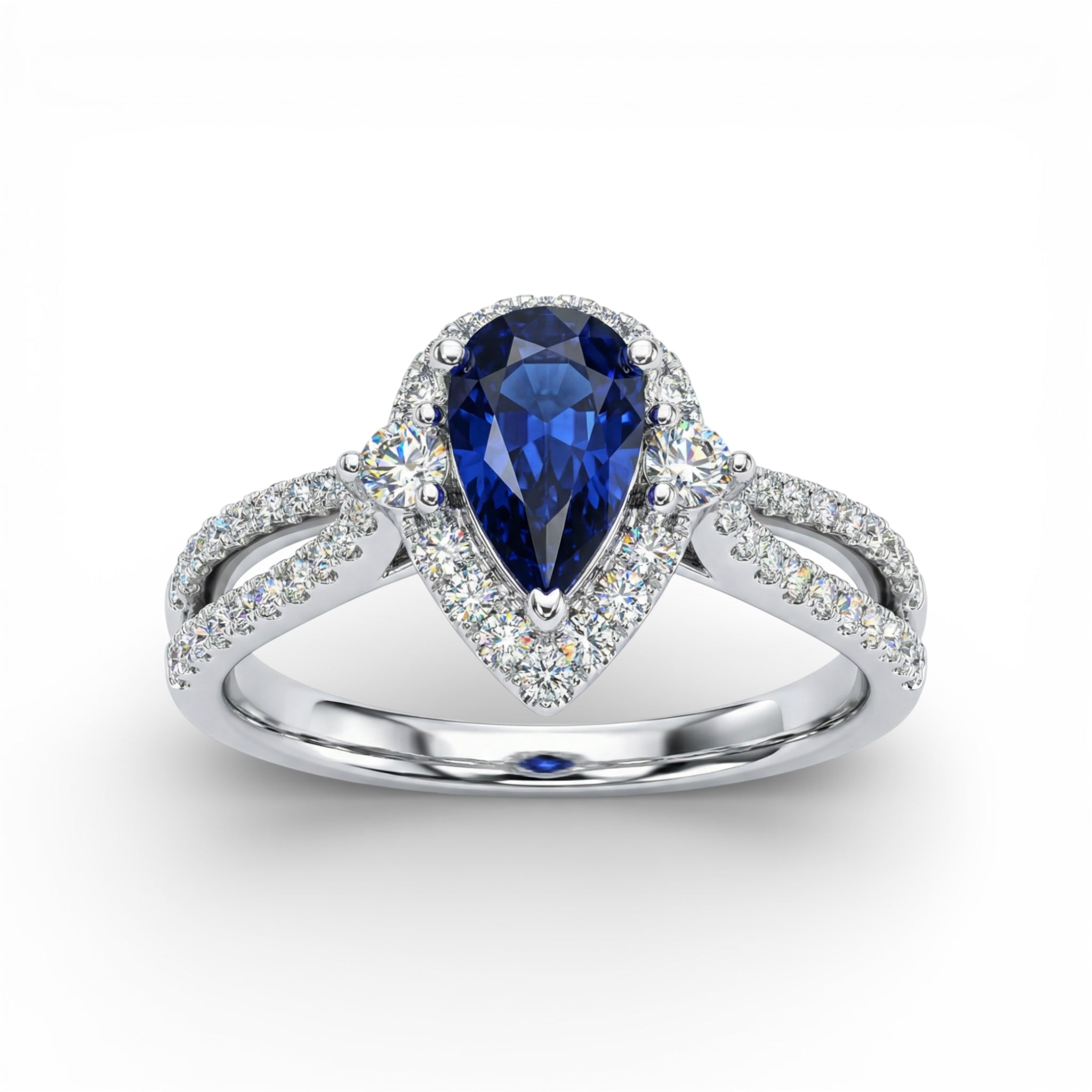 18K White Gold Pear Cut Sapphire with Diamond Halo Ring