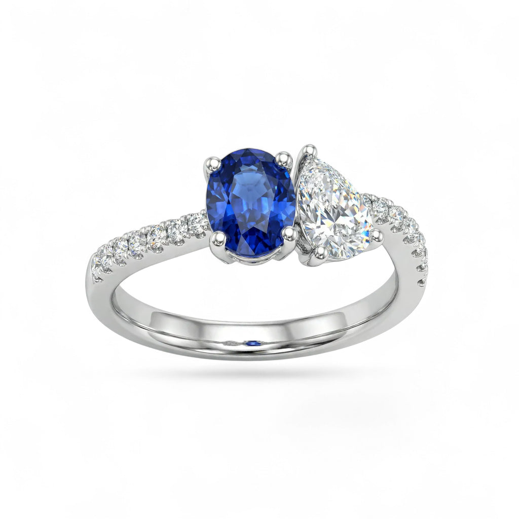 18K White Gold Oval Cut Sapphire and Pear Cut Diamond Ring