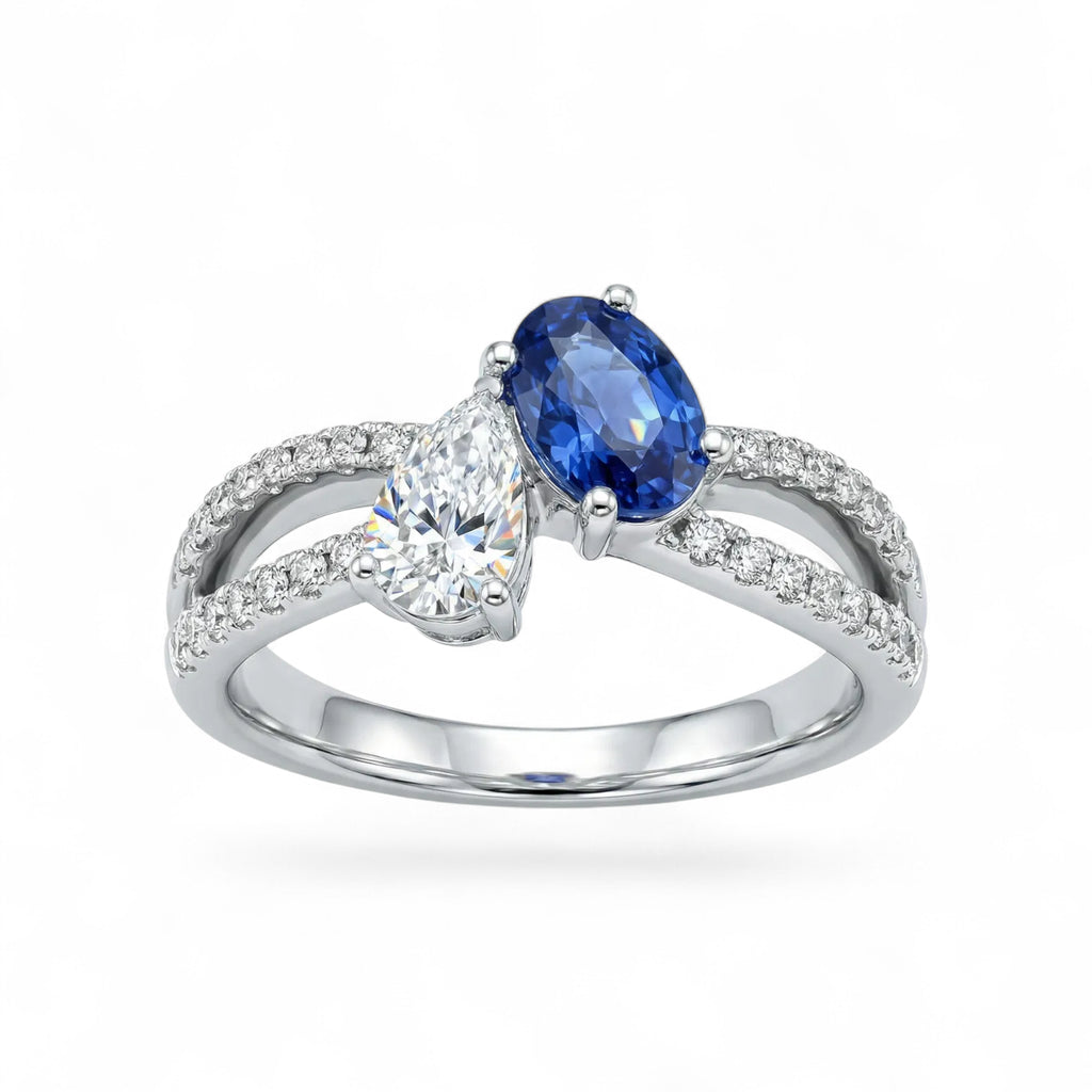18K White Gold Oval Cut Sapphire and Pear Cut Diamond Ring