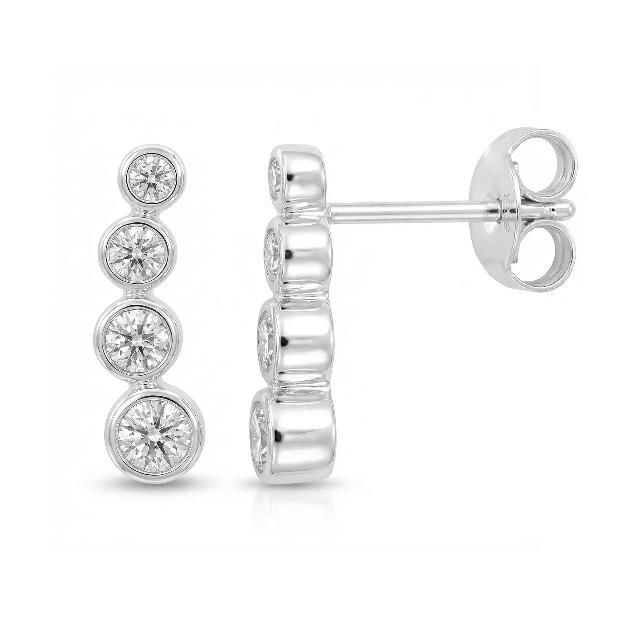 Pair of silver earrings with diamond-like stones on a white background