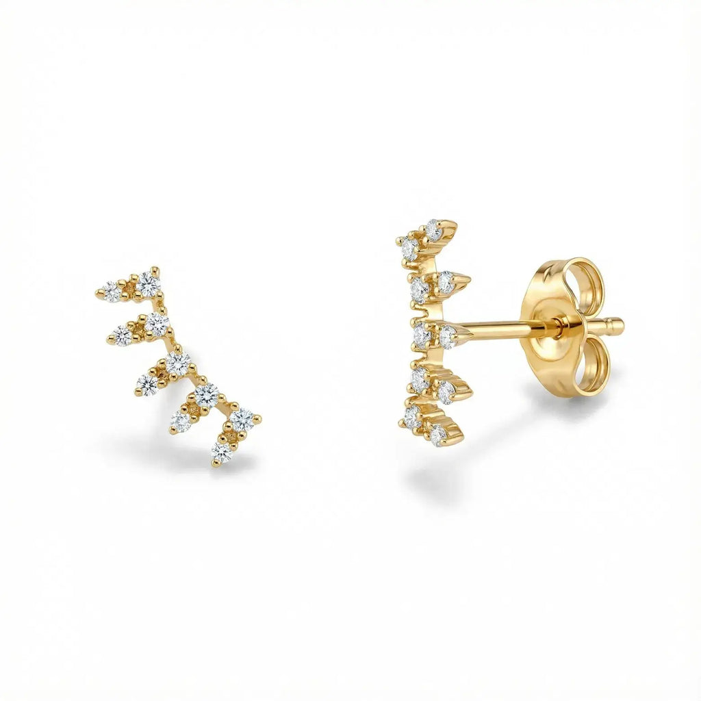 A pair of 14K Yellow Gold Diamond Ear Climber Earrings gracefully ascending the ear, featuring a line of sparkling round brilliant diamonds set in a sleek, modern design.