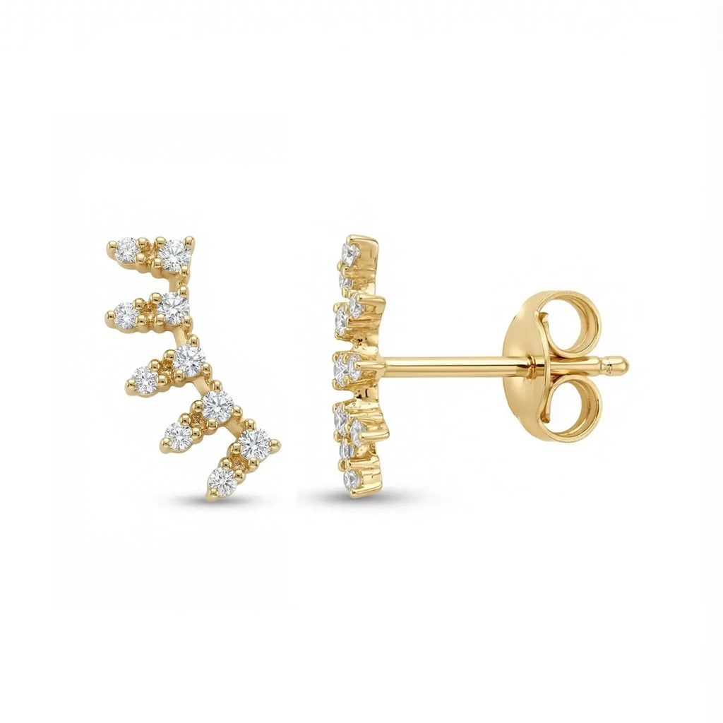 A pair of 14K Yellow Gold Diamond Ear Climber Earrings gracefully ascending the ear, featuring a line of sparkling round brilliant diamonds set in a sleek, modern design.
