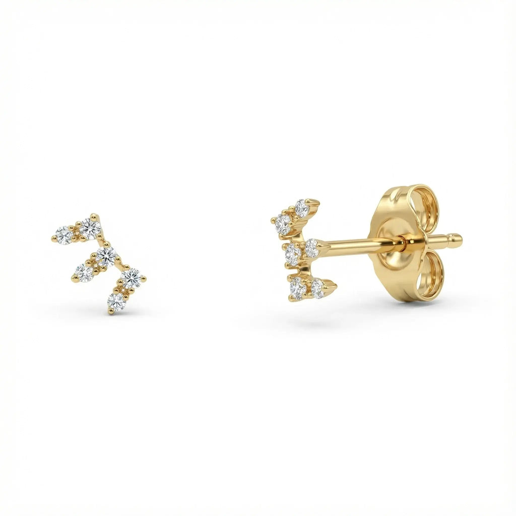 A sleek pair of 14K Yellow Gold Seven-Stone Diamond Climber Earrings, featuring seven round brilliant diamonds set in a straight line that elegantly ascends the ear.