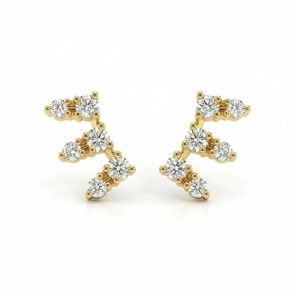 A sleek pair of 14K Yellow Gold Seven-Stone Diamond Climber Earrings, featuring seven round brilliant diamonds set in a straight line that elegantly ascends the ear.