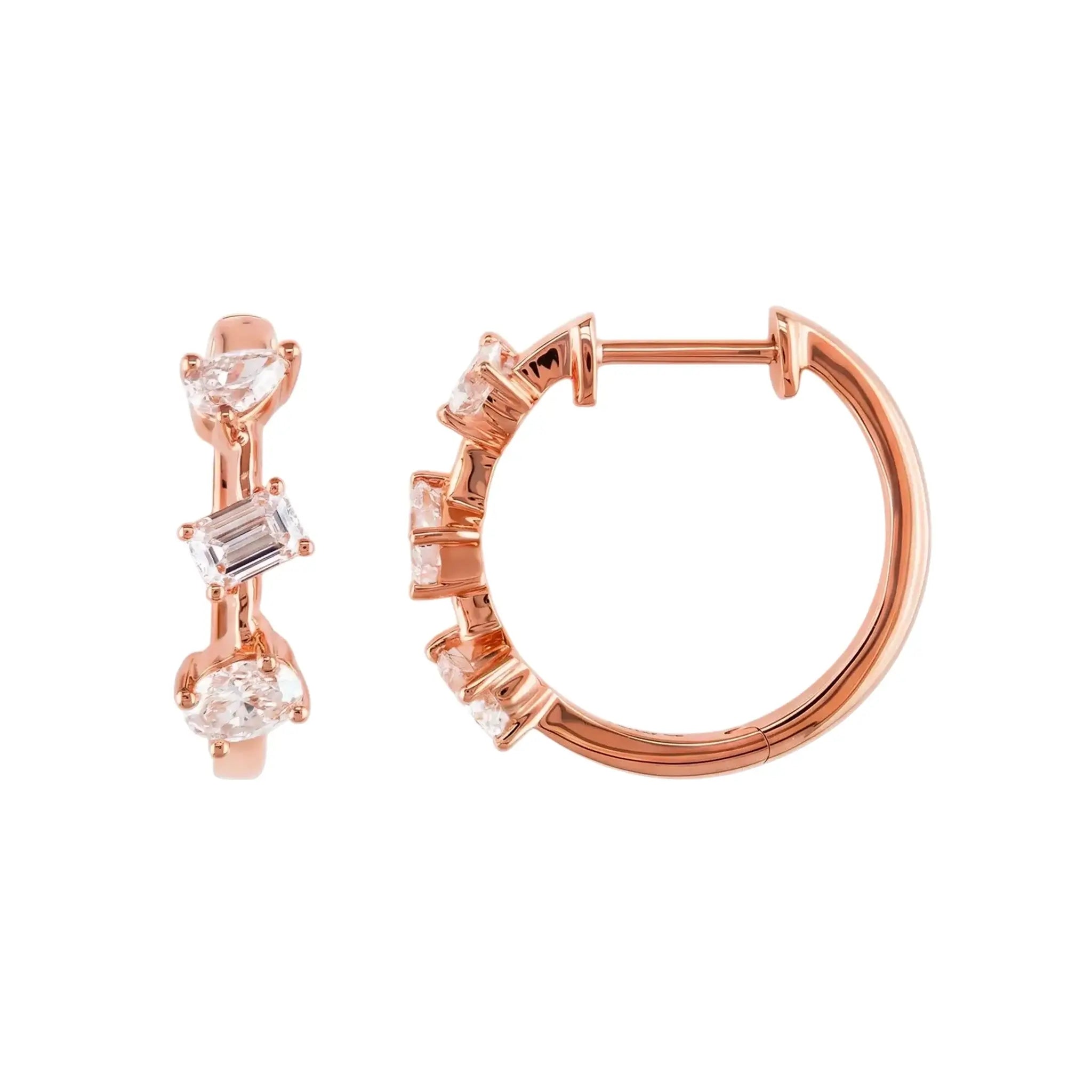A pair of 14K Rose Gold Huggie Hoop Earrings featuring a contemporary geometric design with an assortment of pear, baguette, and oval cut diamonds.
