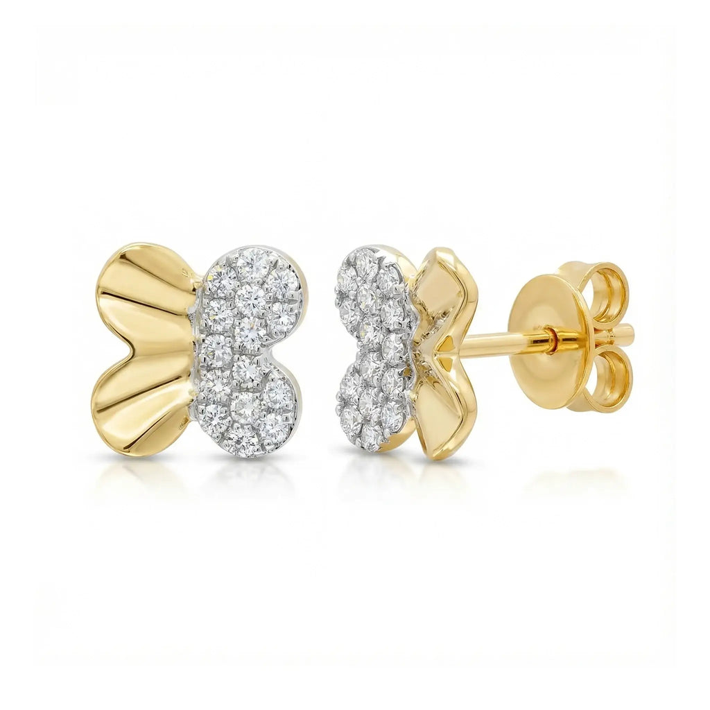 A pair of delicate, sparkling butterfly stud earrings in two-tone 14K gold, with a yellow gold body and white gold wings set with round brilliant diamonds.