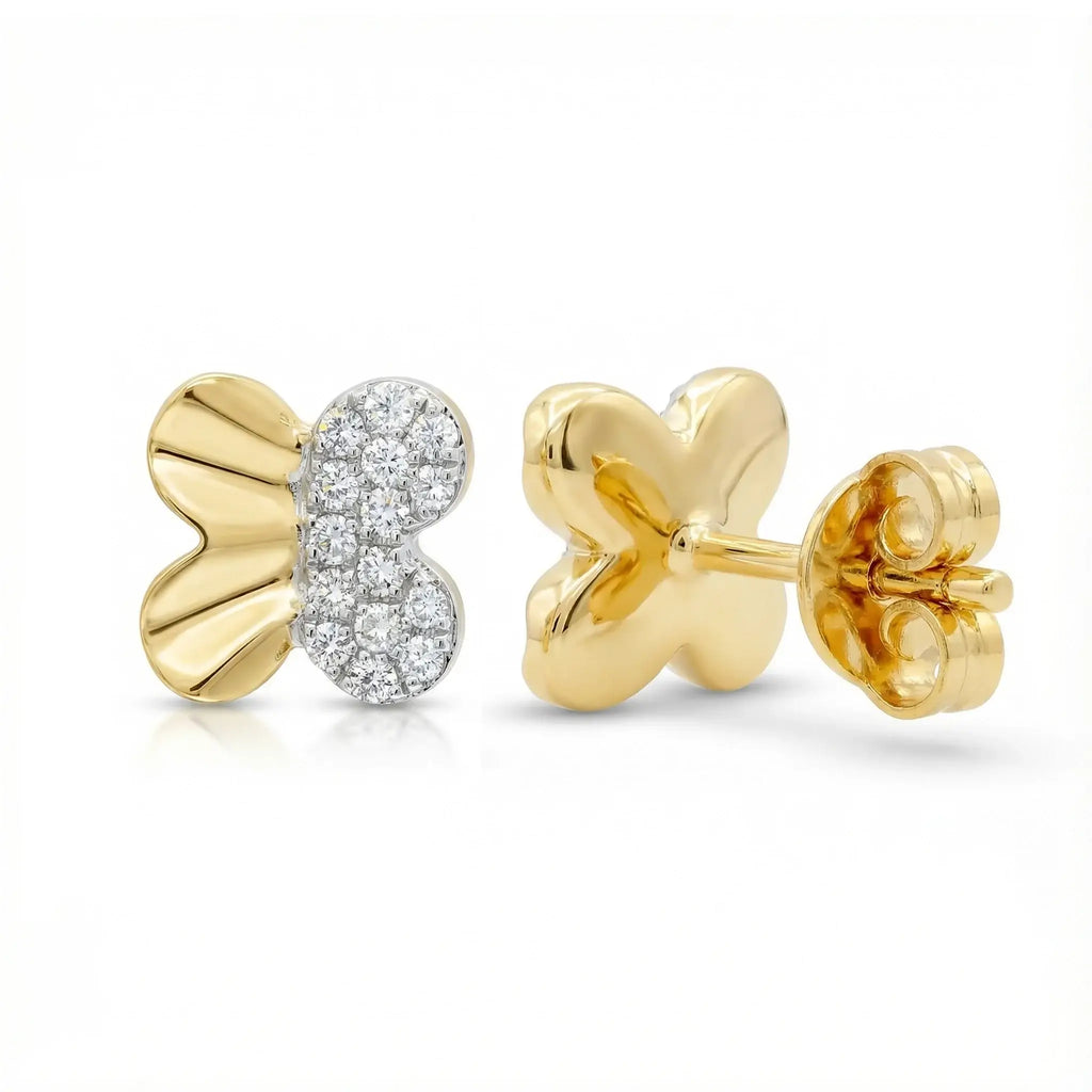 A pair of delicate, sparkling butterfly stud earrings in two-tone 14K gold, with a yellow gold body and white gold wings set with round brilliant diamonds.
