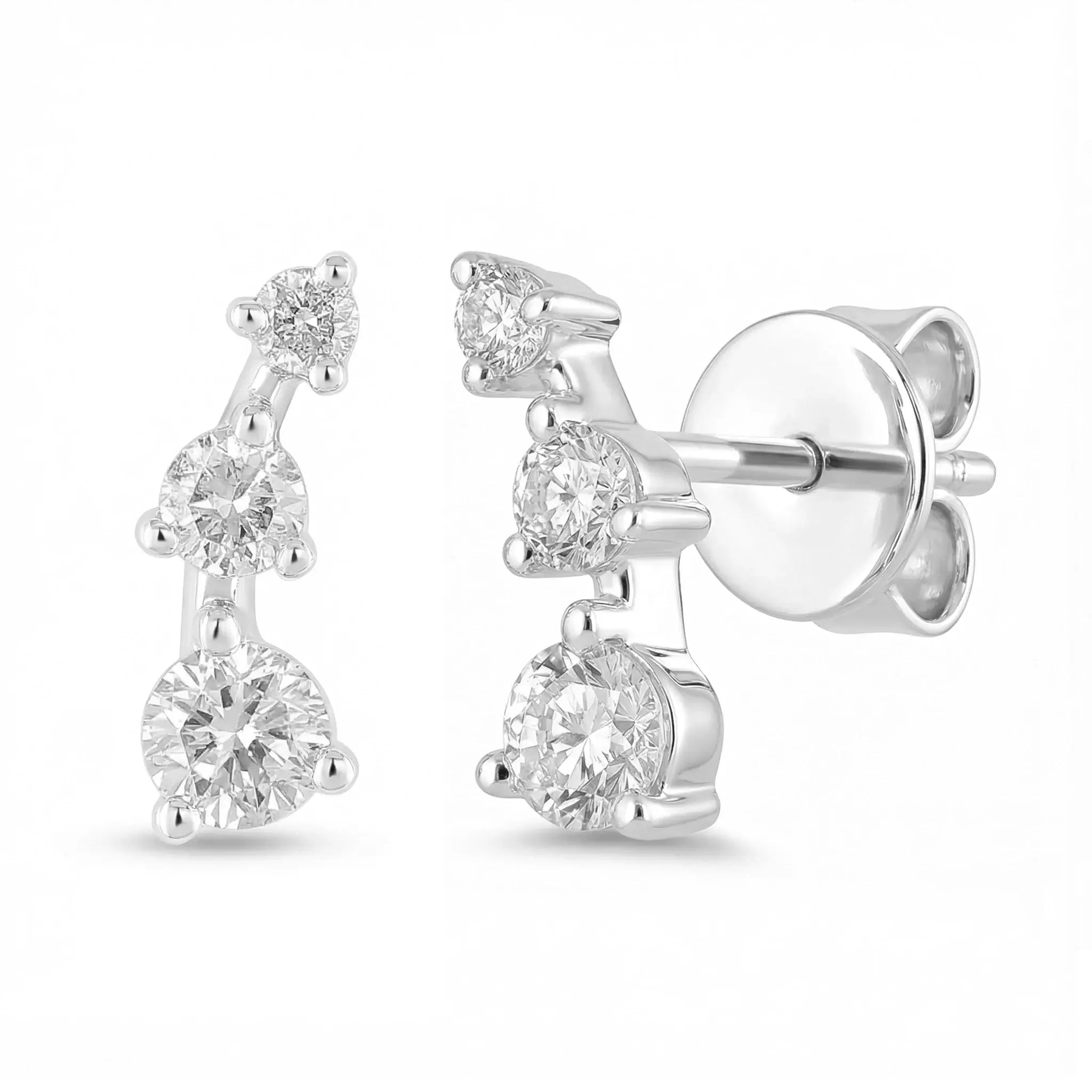 A sleek 14K White gold ear crawler earring, featuring three round brilliant diamonds set in a straight, minimalist line that ascends the earlobe.