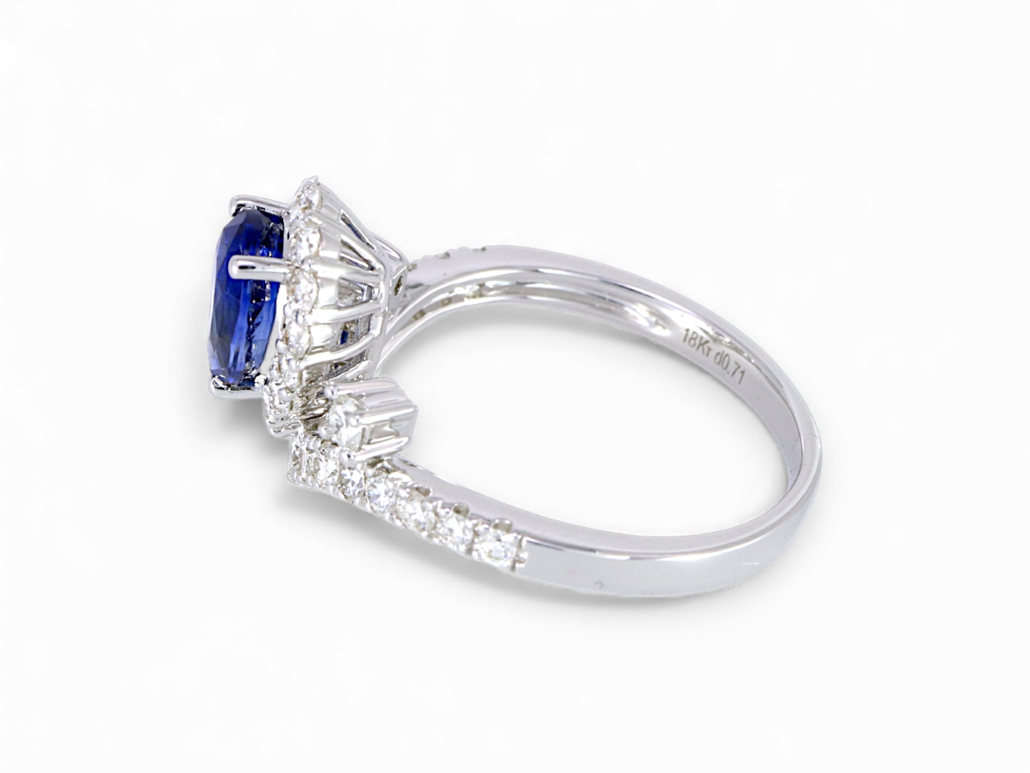 18K White Gold Pear Cut Sapphire with Diamond Halo Ring