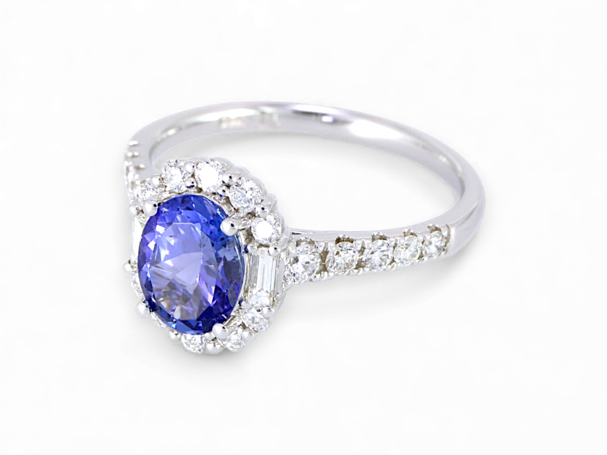 14K Yellow Gold Oval Cut Tanzanite with Baguette Diamond Halo Ring