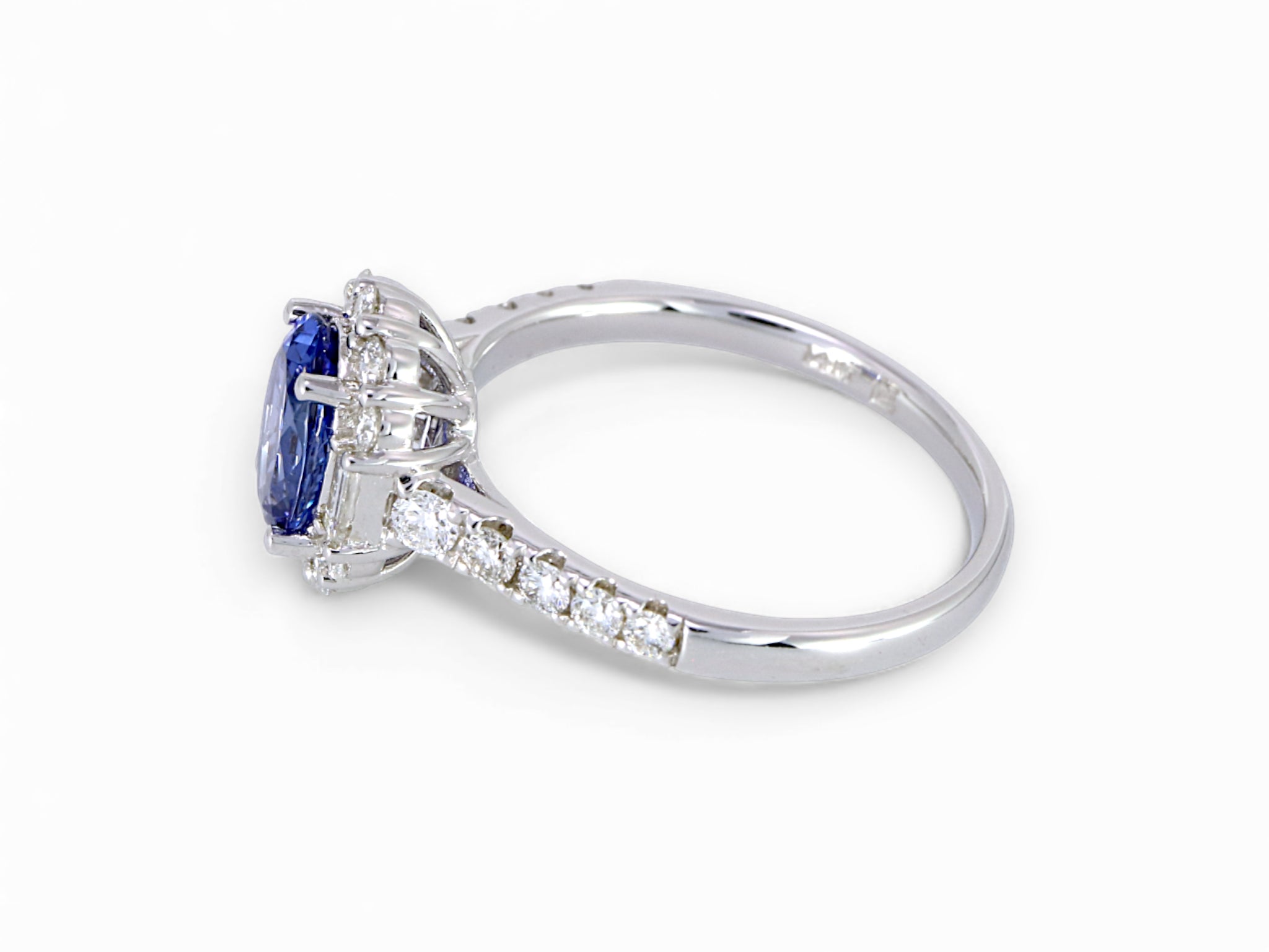 14K Yellow Gold Oval Cut Tanzanite with Baguette Diamond Halo Ring