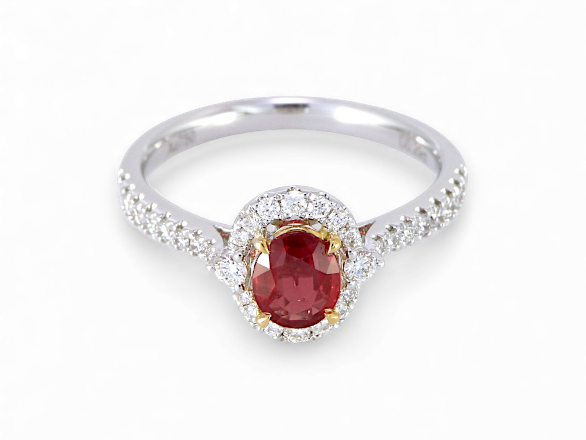 18K White and Yellow Oval Cut Ruby with Diamond Halo Ring