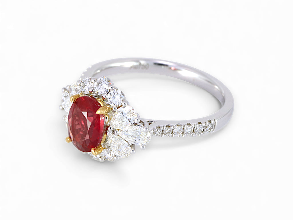 18K White and Yellow Gold Oval Cut Ruby with Pear Cut Diamond Halo Ring