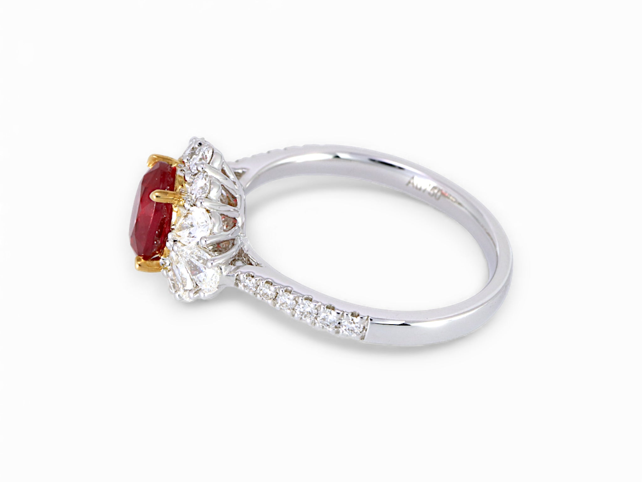 18K White and Yellow Gold Oval Cut Ruby with Pear Cut Diamond Halo Ring
