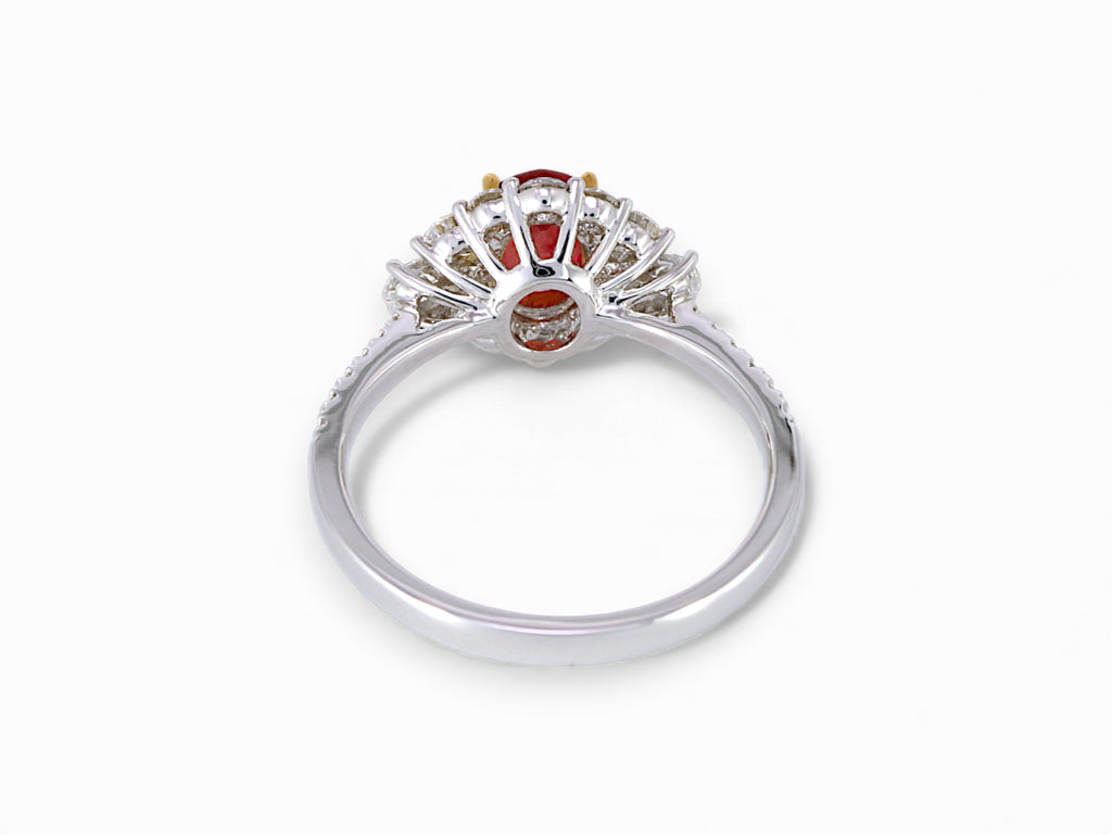 18K White and Yellow Gold Oval Cut Ruby with Pear Cut Diamond Halo Ring