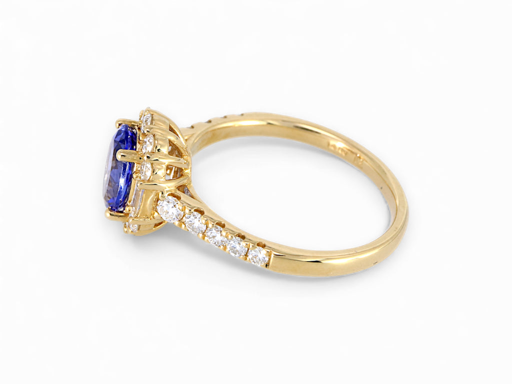 14K Yellow Gold Oval Cut Tanzanite with Baguette Diamond Halo Ring