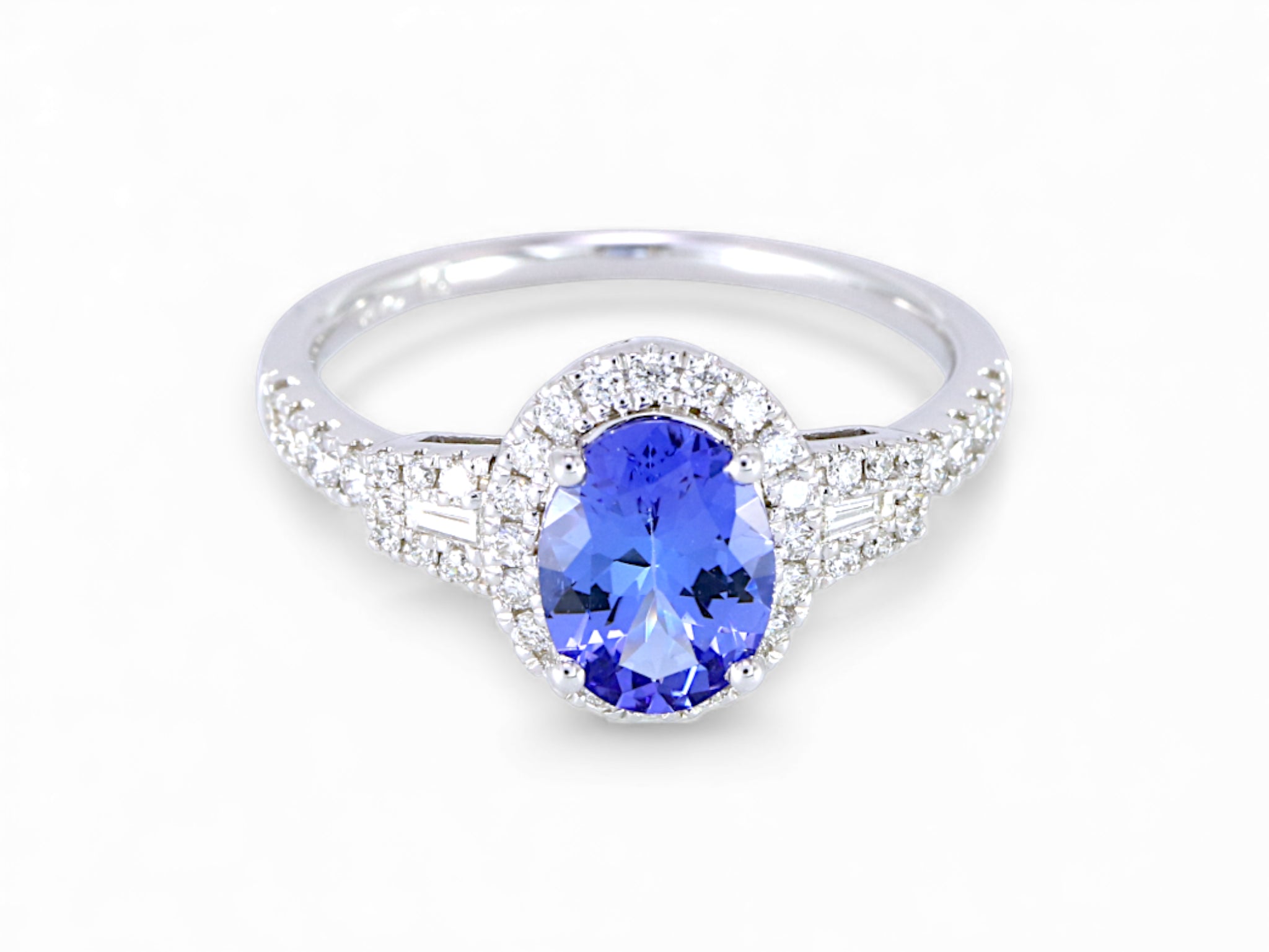 14K White Gold Oval Cut Tanzanite with Taper Diamond Halo Ring