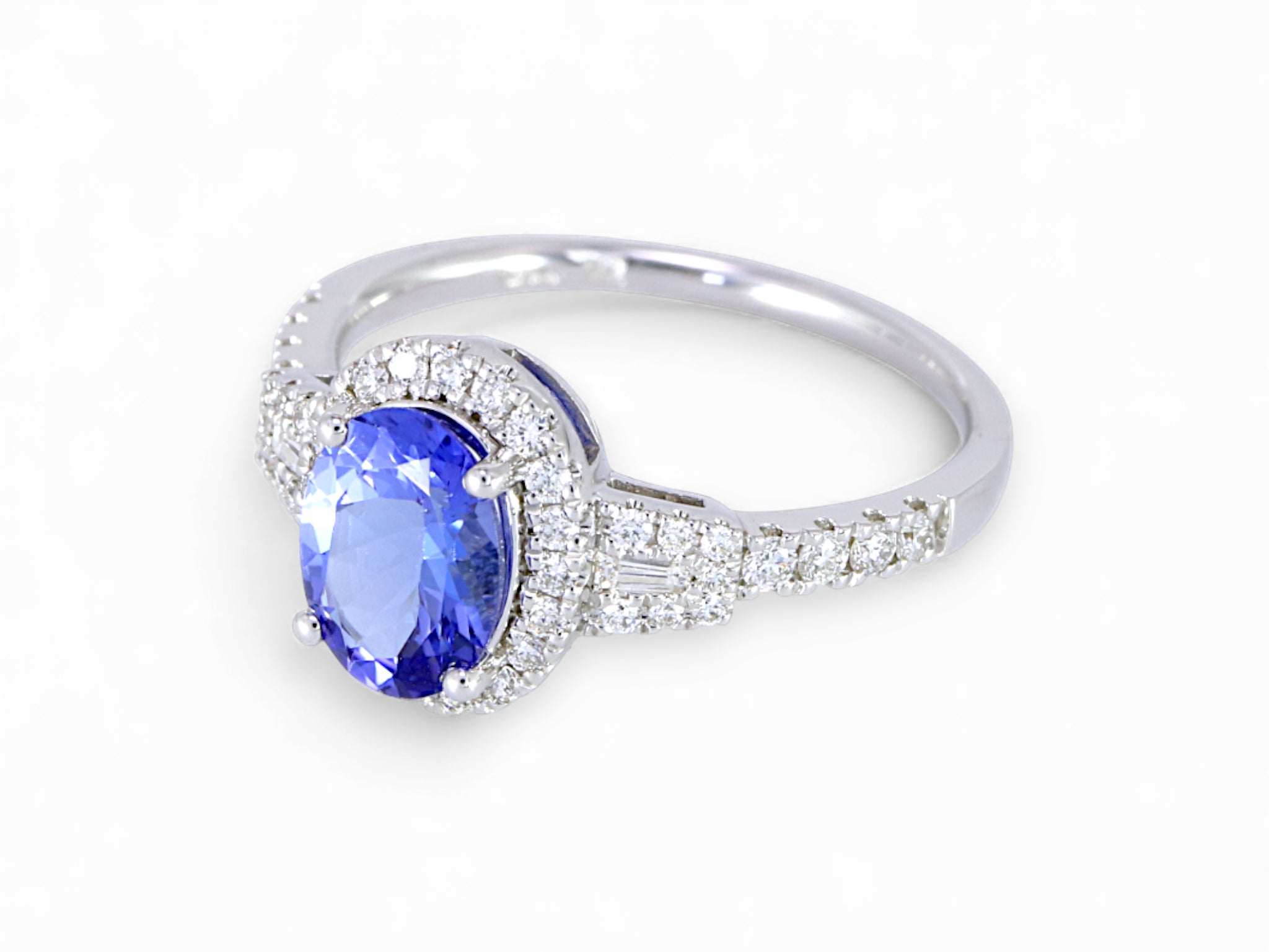 14K White Gold Oval Cut Tanzanite with Taper Diamond Halo Ring