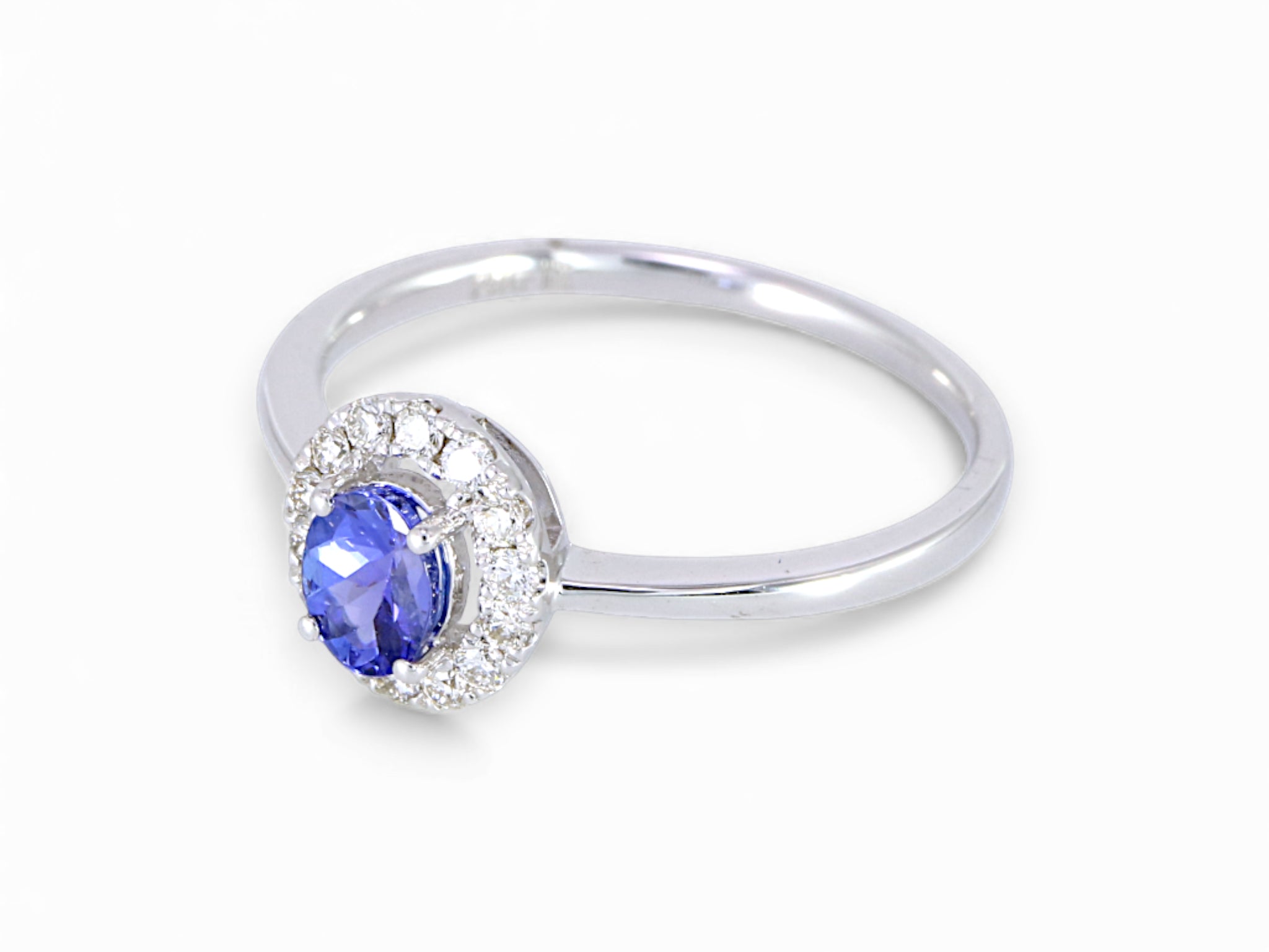 14K White Gold Oval Cut Tanzanite with Diamond Halo Ring