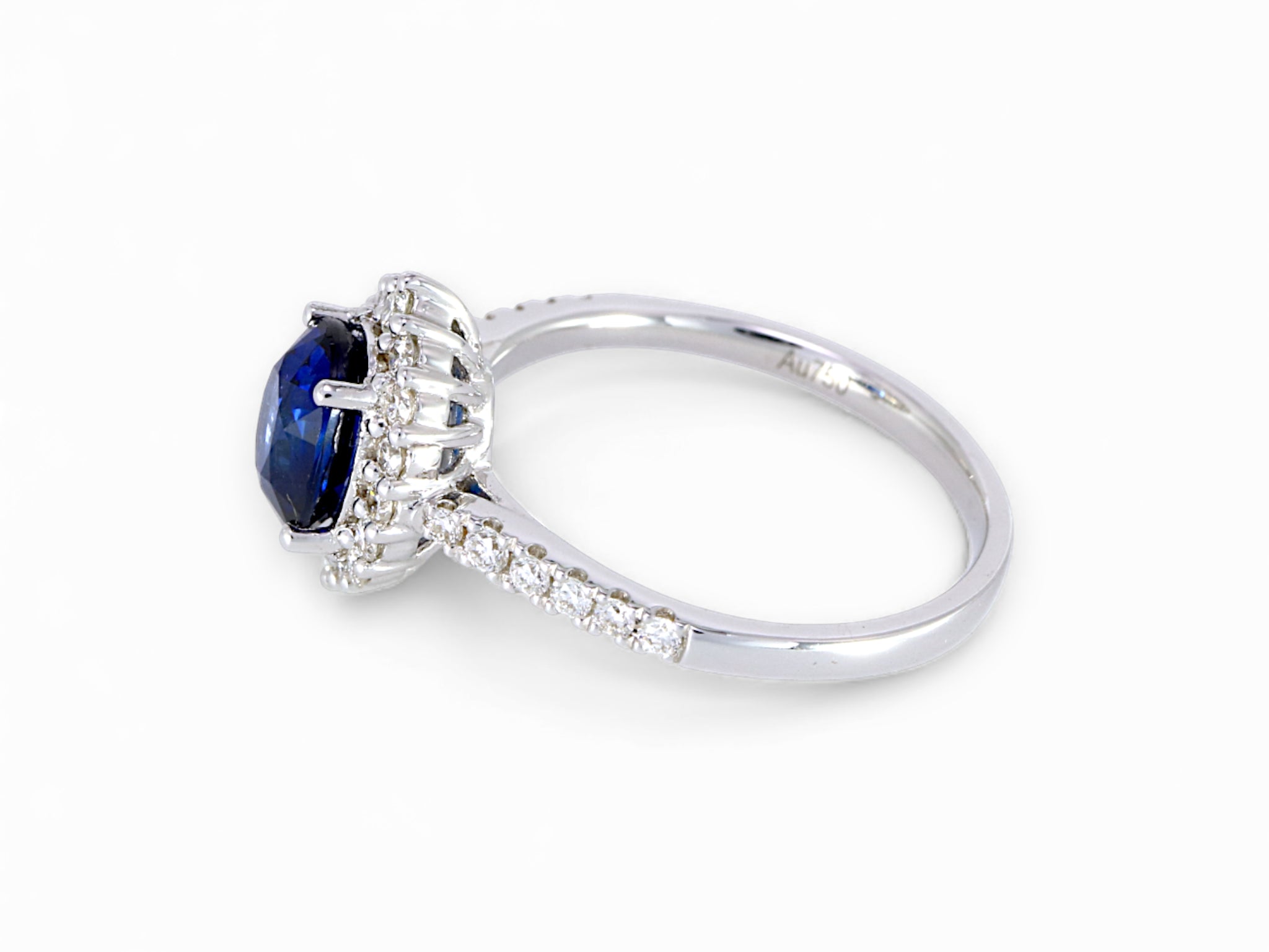 18K White Gold Oval Cut Sapphire with Diamond Halo Ring