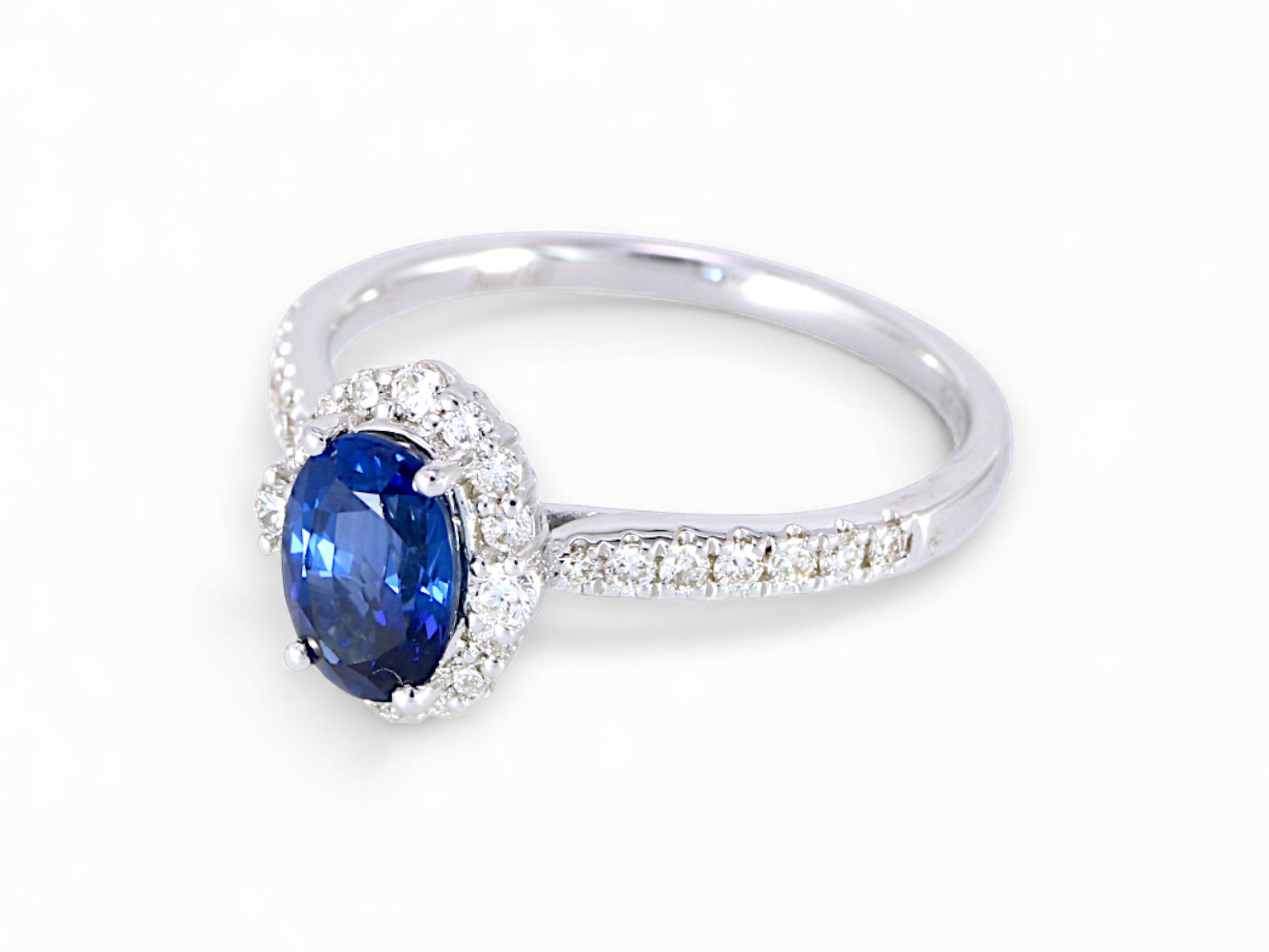 18K White Gold Oval Cut Sapphire with Diamond Halo Ring
