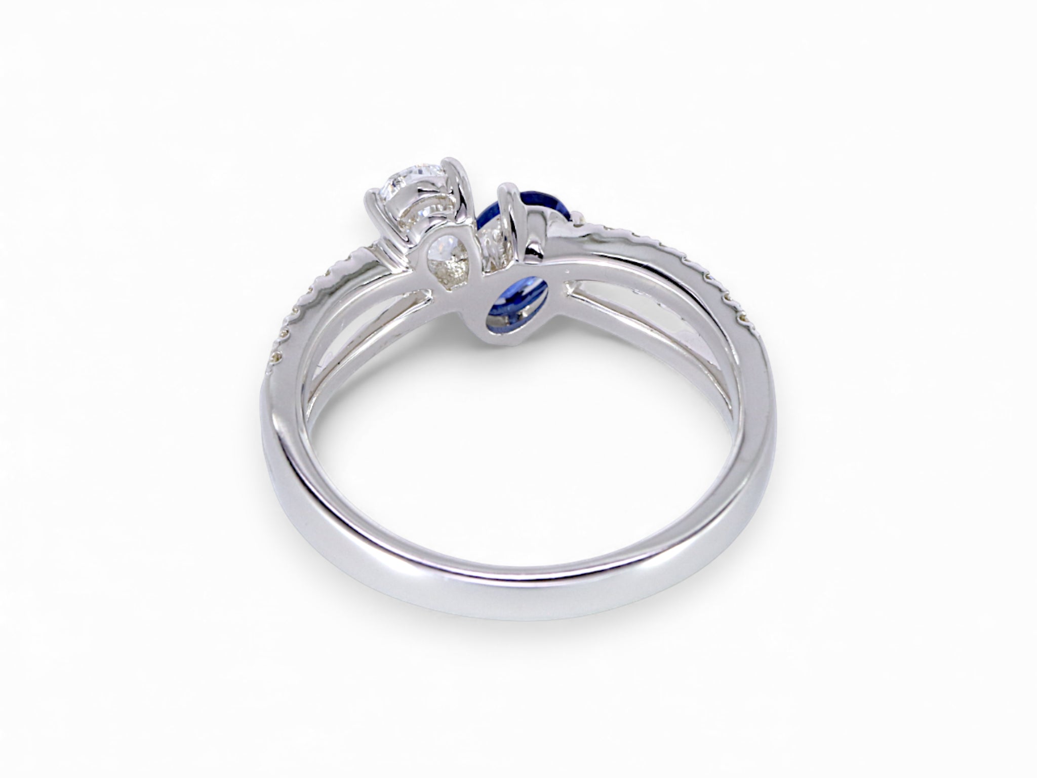 18K White Gold Oval Cut Sapphire and Pear Cut Diamond Ring