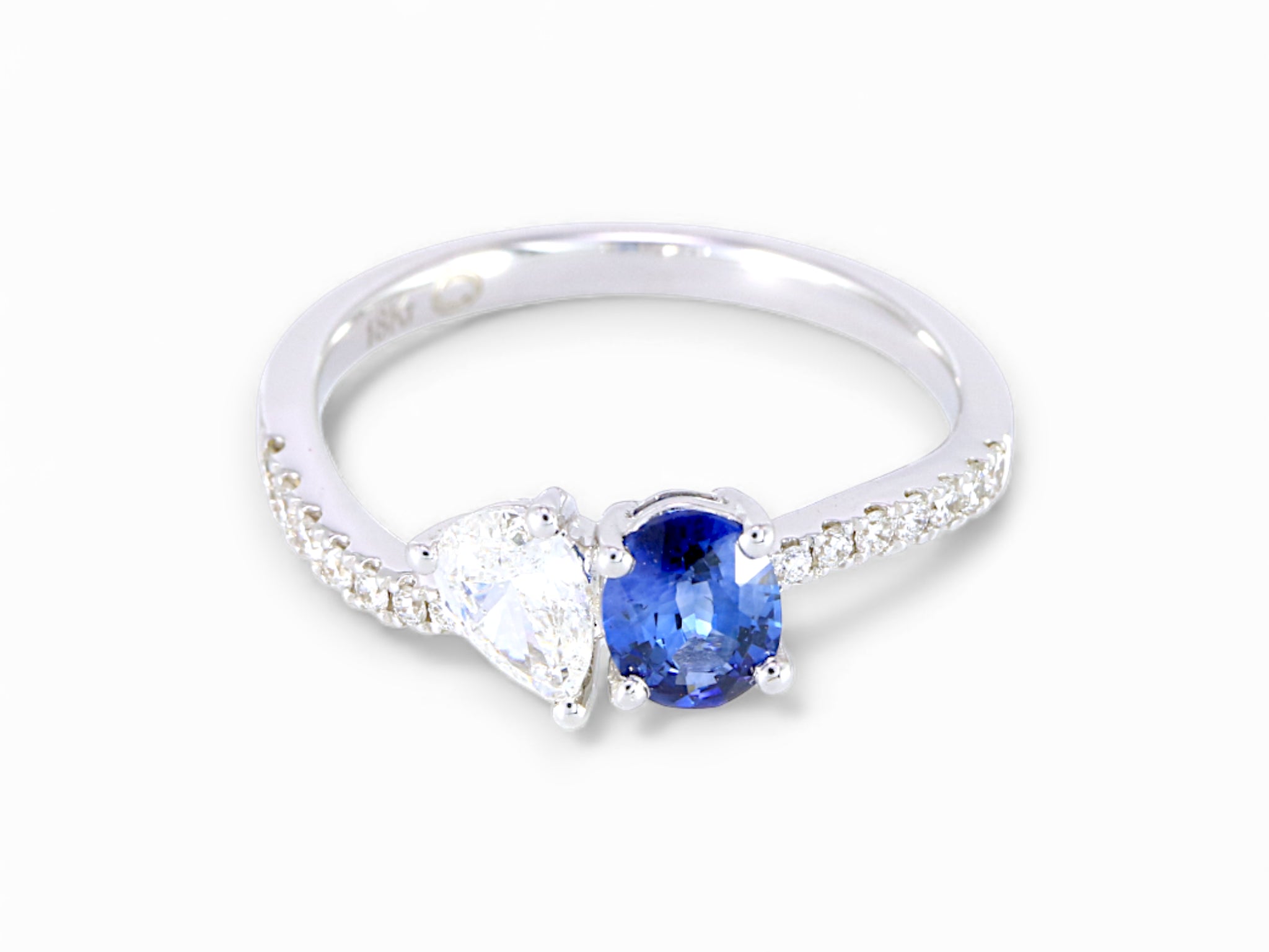 18K White Gold Oval Cut Sapphire and Pear Cut Diamond Ring