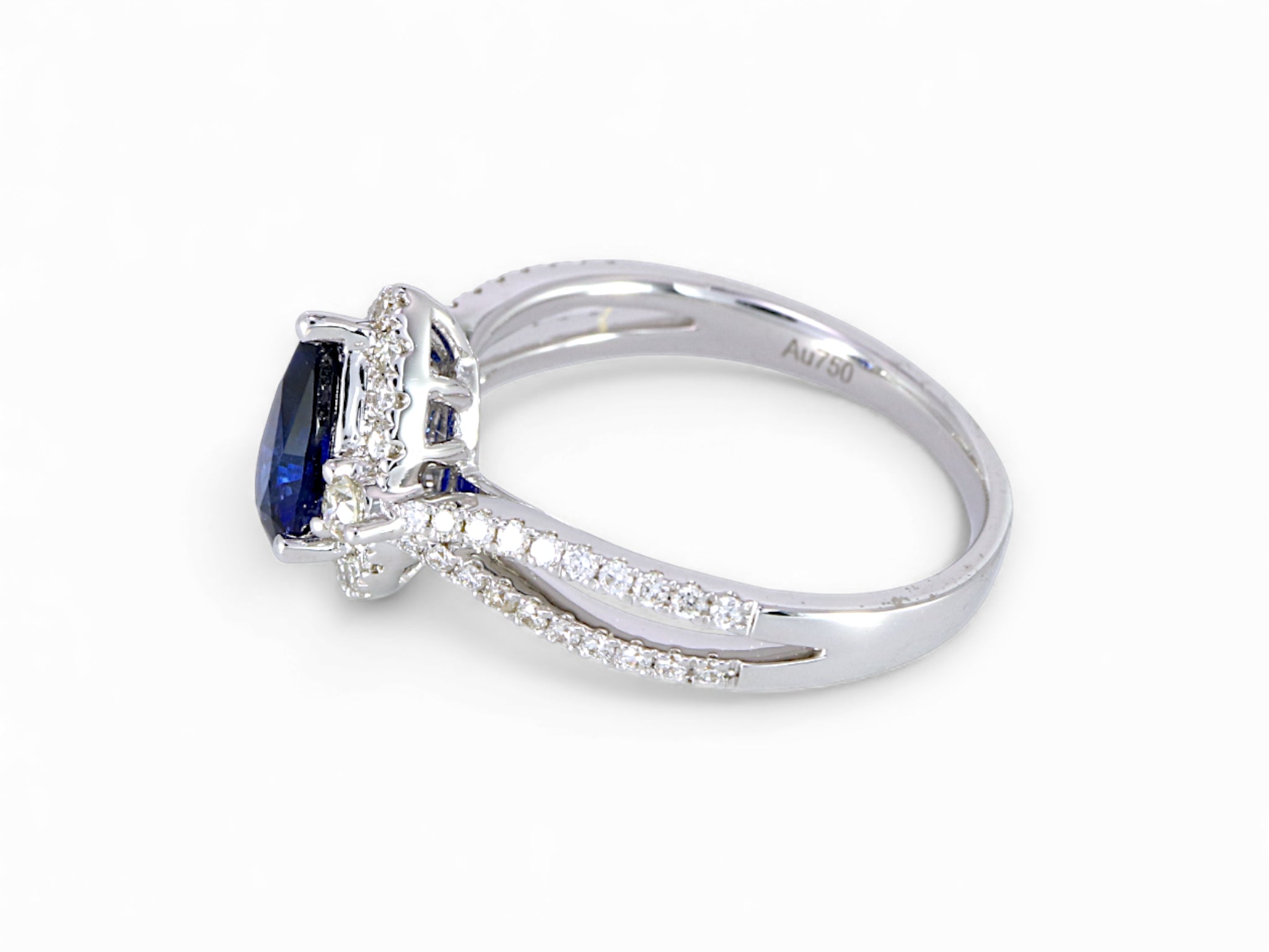 18K White Gold Pear Cut Sapphire with Diamond Halo Ring