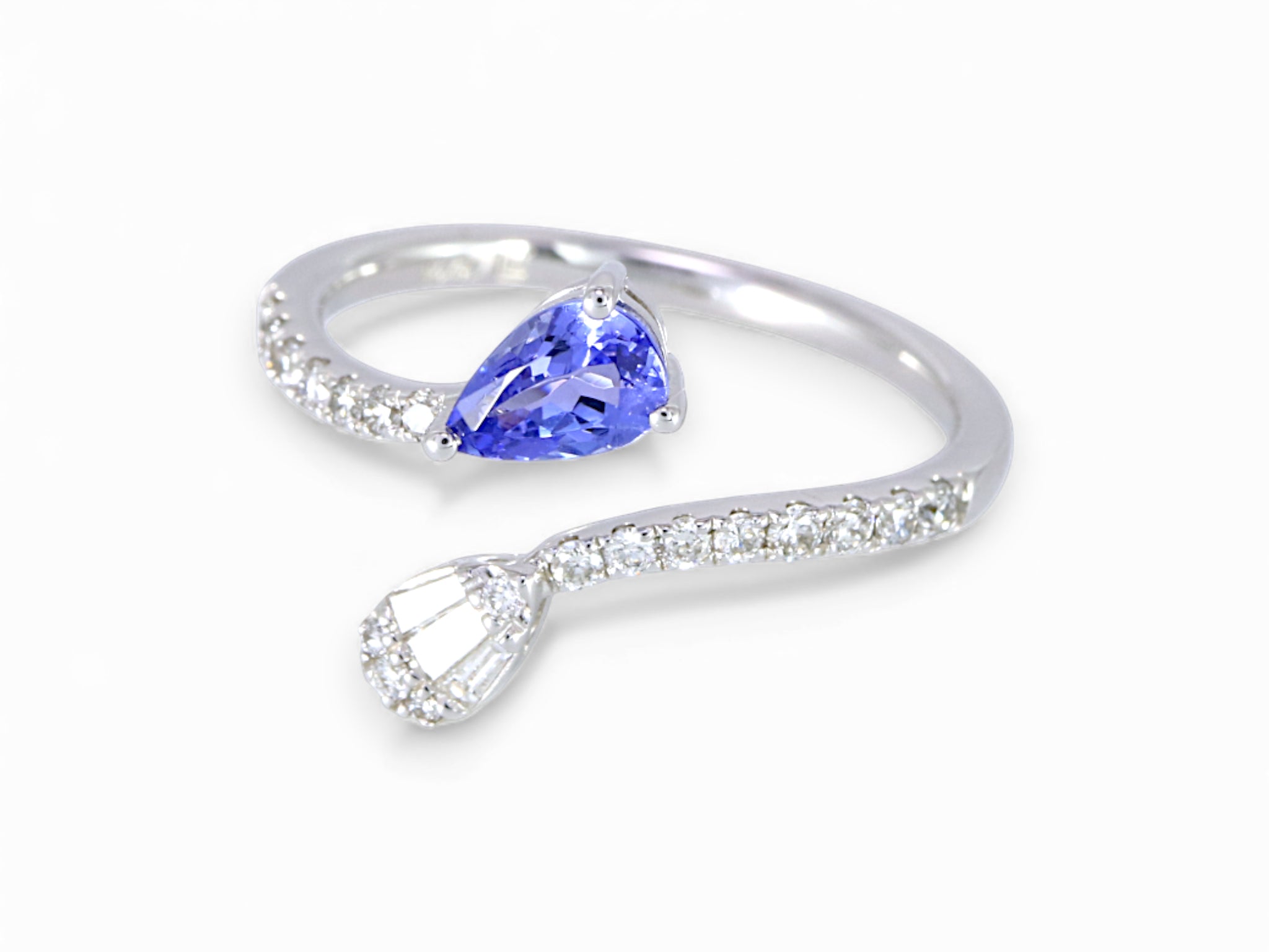 14K White Gold Pear Cut Tanzanite and Taper Diamond Ring