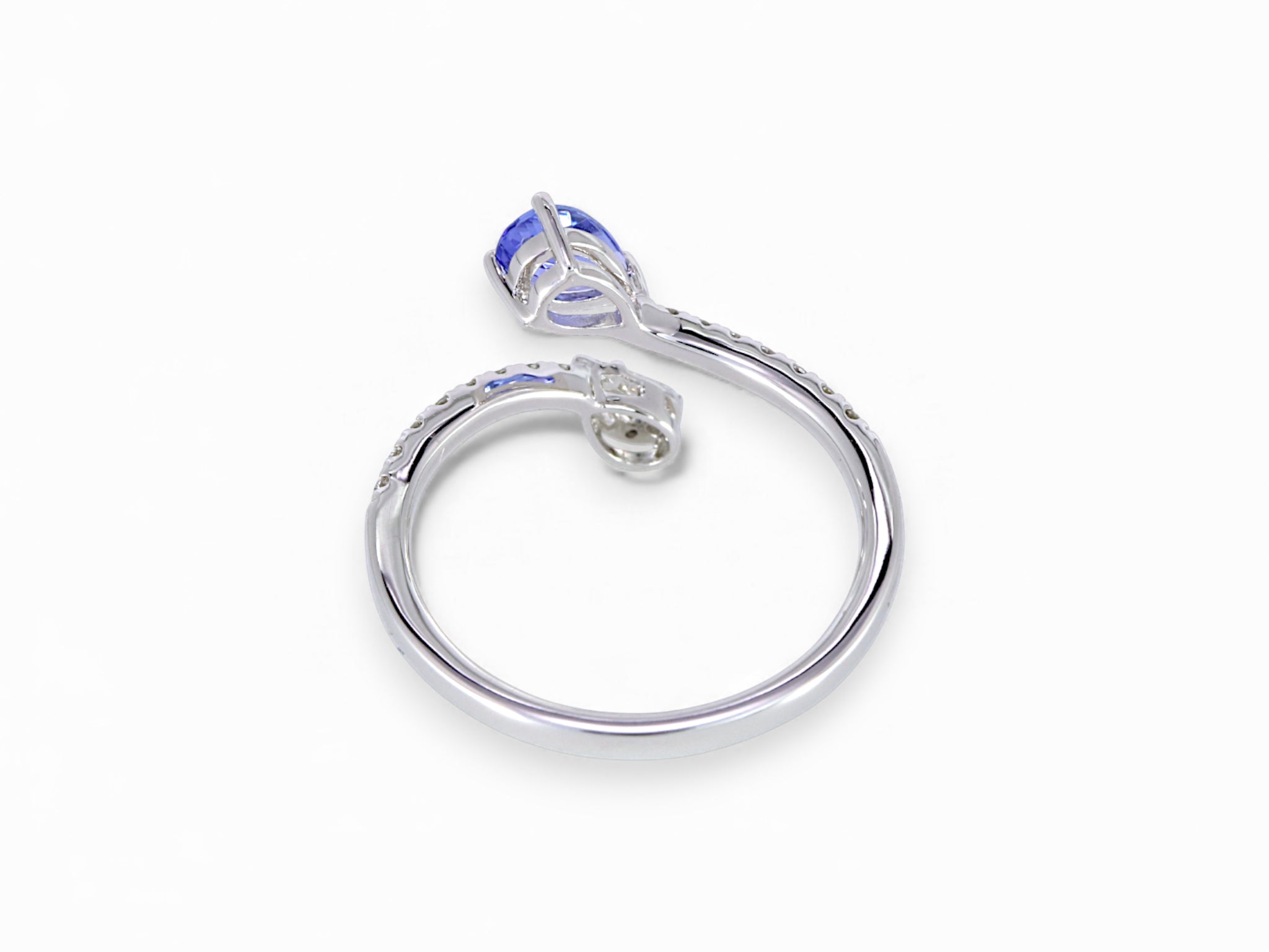 14K White Gold Pear Cut Tanzanite and Taper Diamond Ring