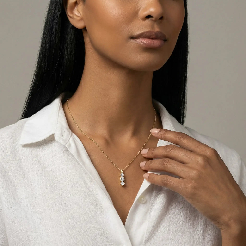 14K Yellow Gold 3 Stone Diamond Pendant - women wearing