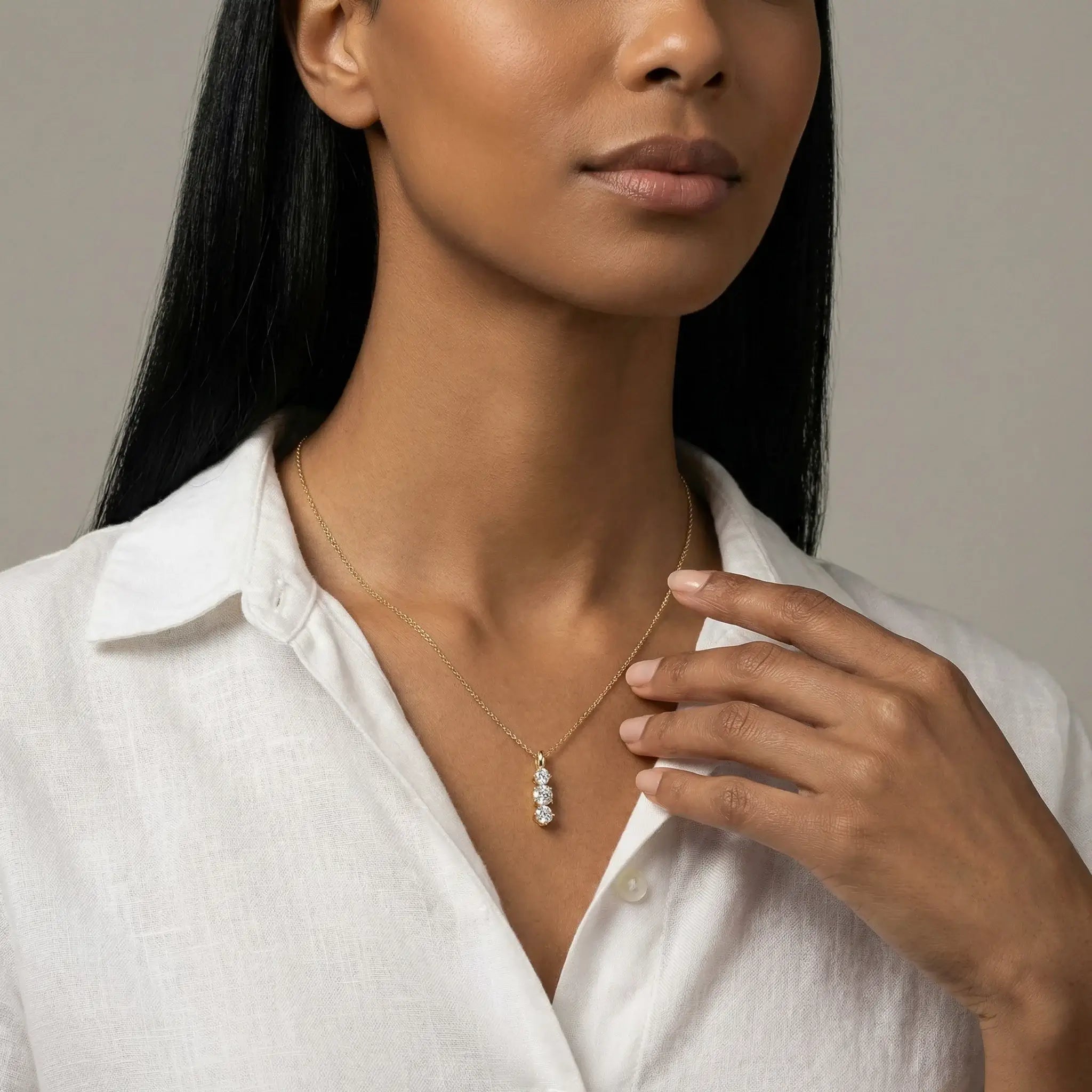 14K Yellow Gold 3 Stone Diamond Pendant - women wearing